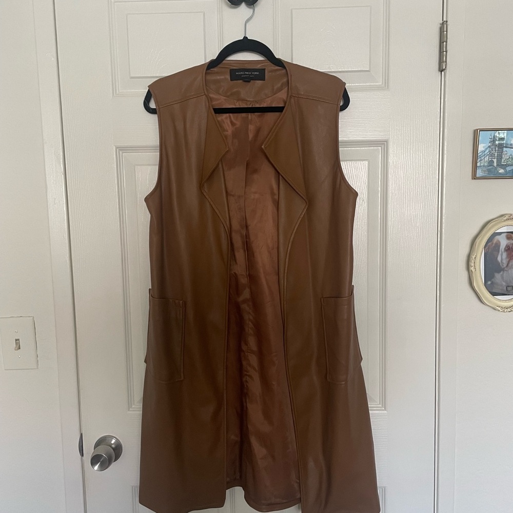 Brown sleeveless faux, long vest with side, slits and pockets